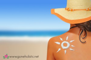 Woman with sun shaped sunscreen on her back